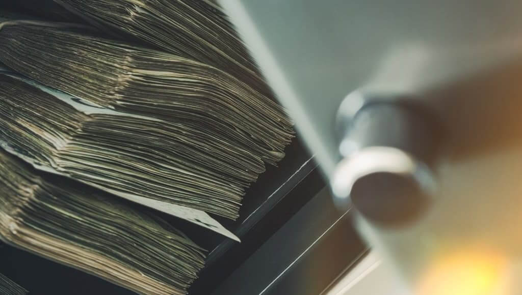 5 Budgeting Mistakes Commonly Made By Startups - image - wads of stacked cash notes