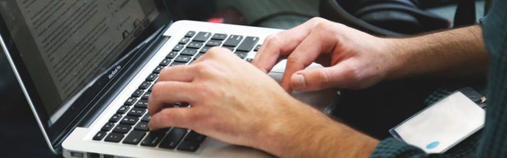 5 Tips for Starting a Digital Business - image - hands typing on laptop keyboard