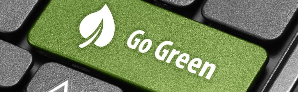 Go green economical keyboard button on a laptop