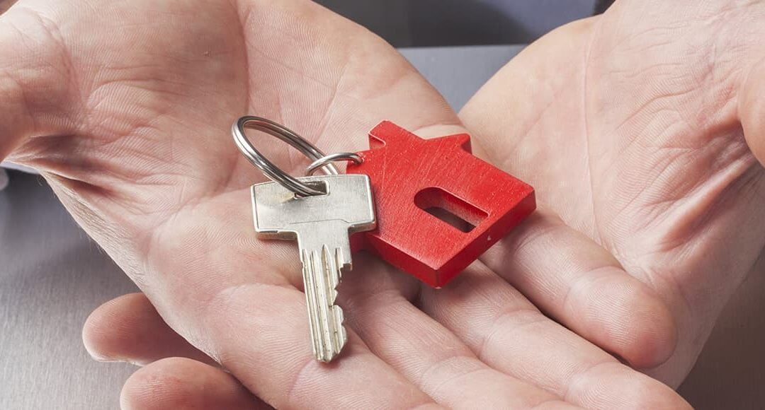 Buy To Let Tax Changes - image - hands holding keys with house keyring