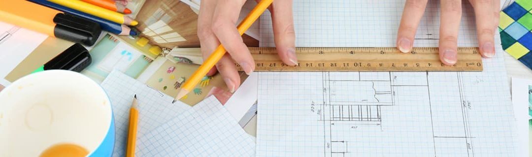 Designers, Toys and Greeting Cards- Entrepreneurial Artists - image - hands drawing house layout on square paper with pencil and ruler