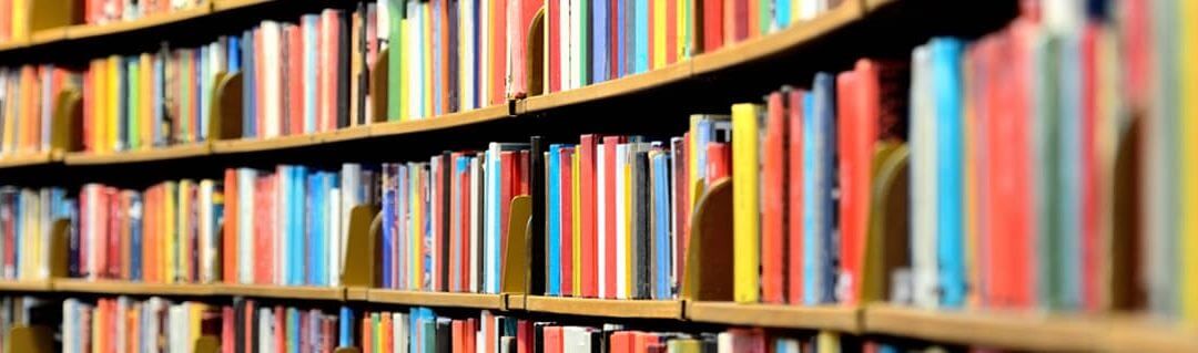 Inspirational books on a bookshelf in a library