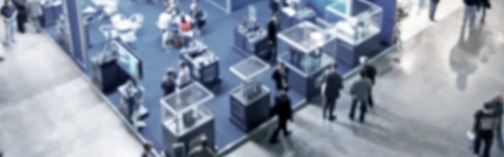 How to make the most of trade shows - Aerial view of a busy trade show/exhibition