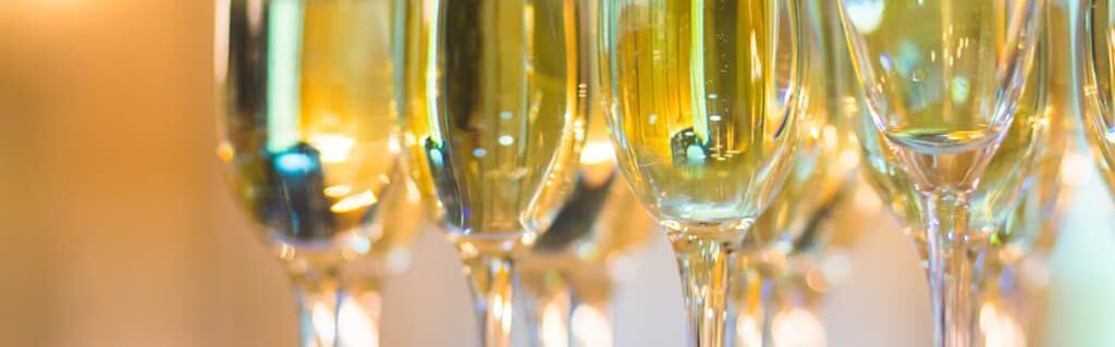 Starting An Event Planning Business image - filled champagne flutes