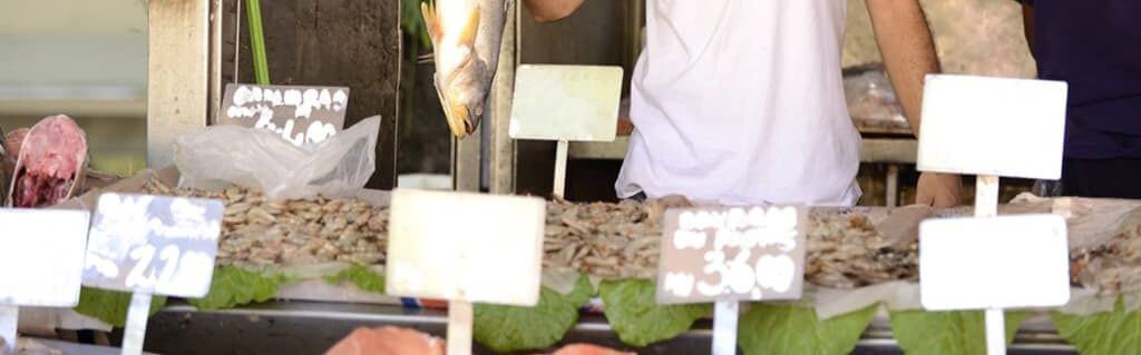 Small business fishmonger owner at a pop up shop