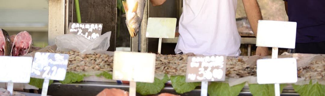 Small business fishmonger owner at a pop up shop