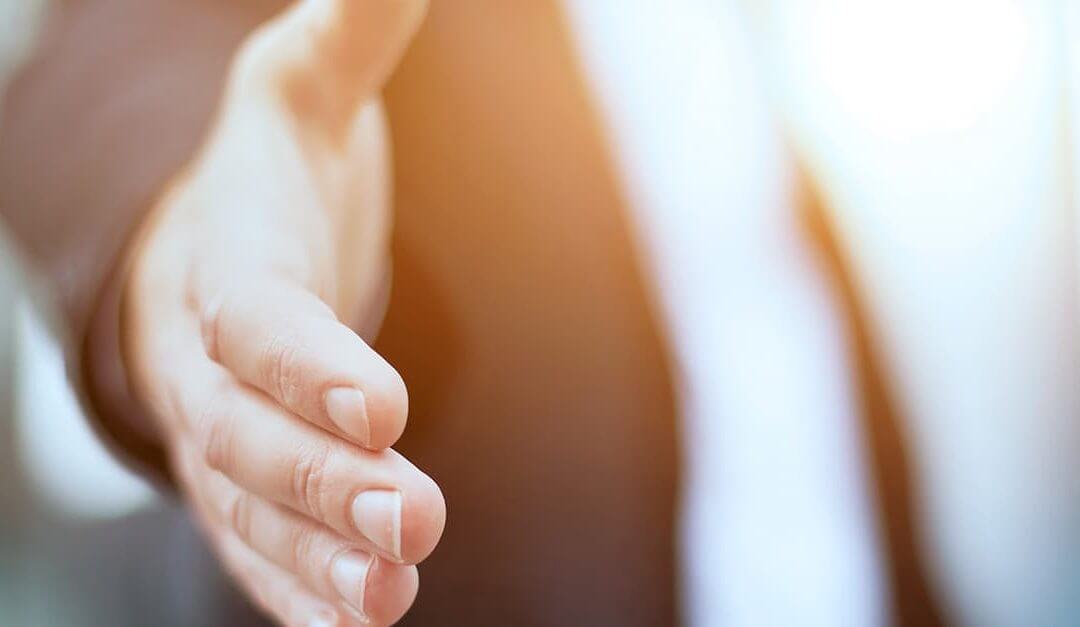 So You’ve Just Formed? Here’s Six Things You Need to do Next… - image - Man in suit about to shake hands