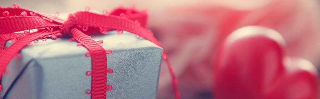 What Valentine’s Day Can Teach Us About Seasonal Business - image - blue present with pink bow